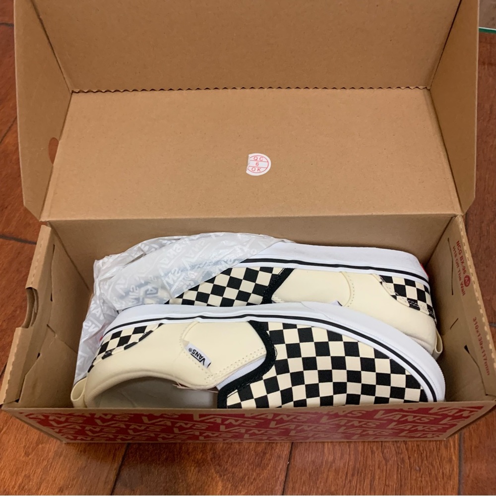 Vans slip on checkered shoes